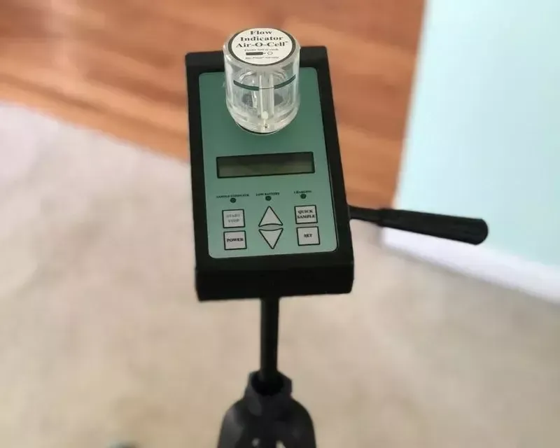Air quality testing pump sampling indoor air for mold spores, Spokane, WA