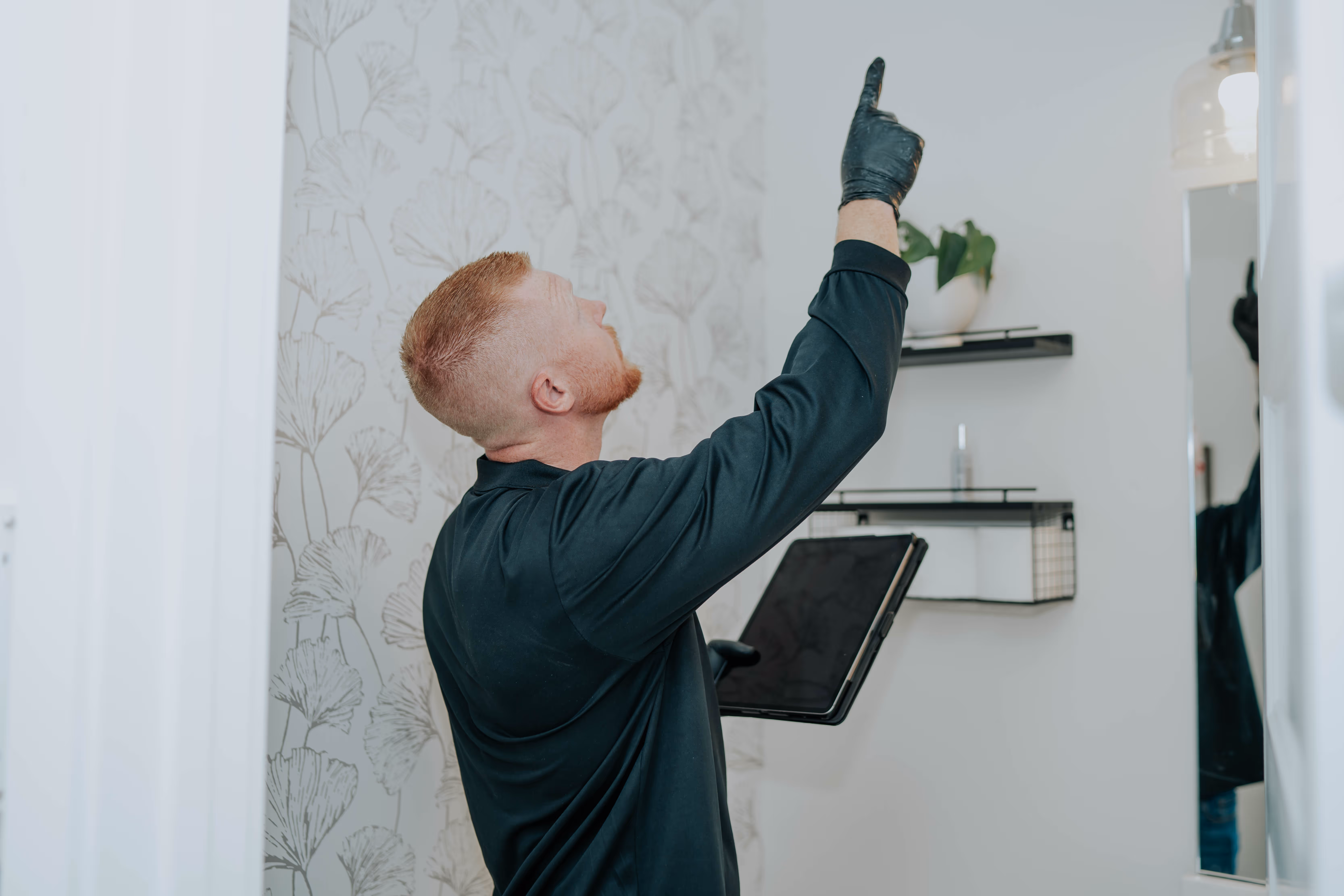 My Pure Environment technician conducting a full property mold inspection